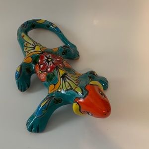 Colorful Lizard with a hole on the bottom to hang. Great to display on table.